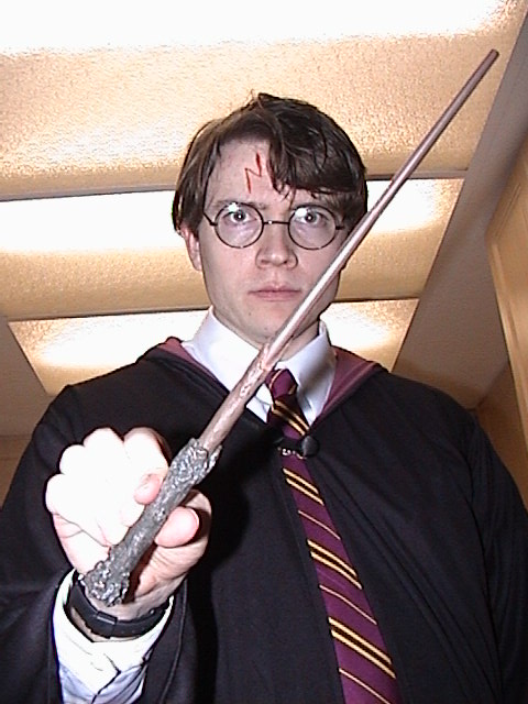 me in Harry Potter costume: wand shot